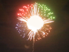 5” Display Shell( Specialty Shell) 1/4 Red & Green & Blue & Yellow Peony W/cross Ring W/cracking Pistil W/tail